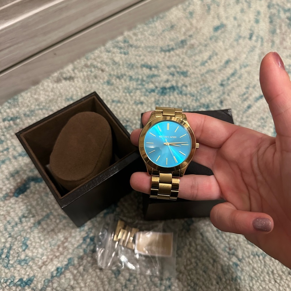Michael Kors gold and turquoise watch